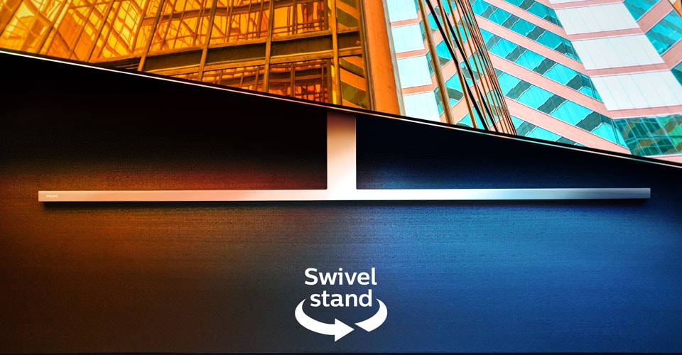 Egy forgóállványon álló Philips Ambilight TV, amelyen két színes építészeti jelenet látható, egy nyíllal és egy szöveggel jelezve a forgatási funkciót
